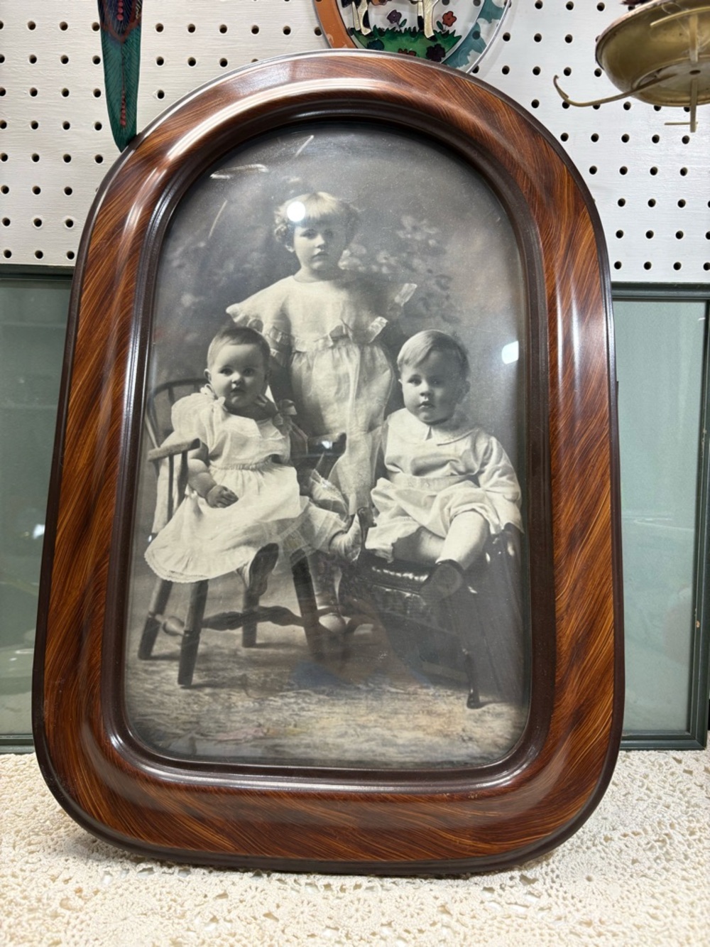 antique portrait featuring convex bubble glass
